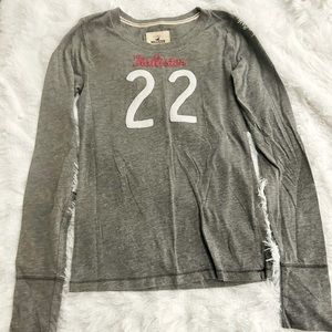 Hollister long sleeve tee. Gray with pink and white detail. Size S.